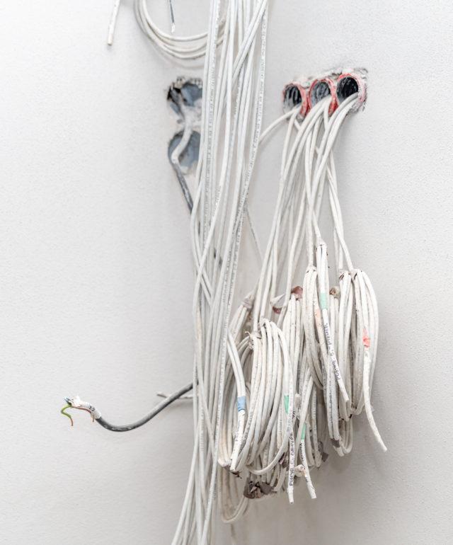 bundle of wire in the wall to connect the smart home. preparation for the Internet, sound system and room lighting